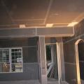 Drywall is installed, hiding the duct work