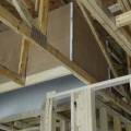 Modified truss to allow for raised ceiling sections for ducts