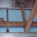 Seal bottom layer of rigid insulation with adhesive, tape and nails