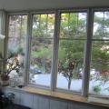 Factory-made interior removable storm windows have a flexible silicon frame press into place to air seal and insulate the existing window.