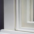Interior removable storm windows should fit snuggly into the window frame