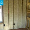 Right - Closed-cell spray foam insulation fills the wall cavities of the exterior walls in this home retrofit