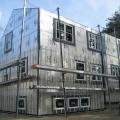 Right – This foil-faced foam sheathing has taped seams and proper flashing details so it can serve as a drainage plane.