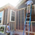 Windows are installed in new framing in preparation for adding exterior spray foam insulation