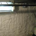 Right - Closed-cell spray foam was applied to the interior of a foundation wall.