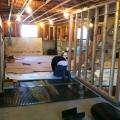 Right - Retrofit of an existing basement slab by adding dimple plastic mat, rigid foam insulation, and a floating subfloor.