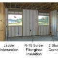Advanced framing details include open headers and reduced framing around windows and two-stud corners to allow more room for insulation in the wall cavities while reducing lumber costs.