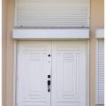 Right - This door and window have a permanent protective covering system.