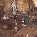 Wrong - The sump pump alone cannot address the water infiltration issues in this crawlspace. 