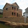 This builder employs good water runoff managementpractices to control sediment during construction and to ensure that stormwater drains away from the house after construction.