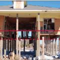 This home constructed in a V Zone in Bolivar Peninsula, Texas, had the bottom beam of the lowest floor at the BFE (dashed line) but the estimated wave crest during Hurricane Ike was 3 to 4 feet higher (solid line).  