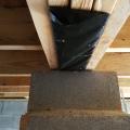 Wrong - A vapor barrier should cover the top of the concrete block pier support in the crawl space.