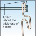 Allow 1/32" clearance between the fastener head and the vinyl siding panel. 