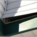 Wrong - Utility trim was substituted for the starter strip and the bottom lock was cut off this vinyl siding so the siding pulled loose under wind pressure. 