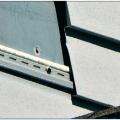 Wrong – The vinyl siding was not properly locked into the panel below. 