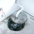 Install the sump pump cover