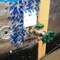 Right - The water and air control layers are properly integrated around the hose bib