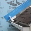 Step 5. Apply self-adhesive flashing over top edge of the wall flashing, diverter, and rigid foam insulation