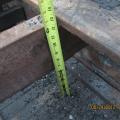Sheathing is removed from a flat roof to retrofit with air sealing, insulation, and water control layers