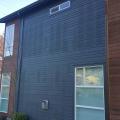 Wrong - Dark pattern on wall is showing where warm air is leaking into the wall cavity from interior of home.