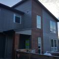 Wrong - Dark patterns on the Home's exterior siding show where warm air is leaking into the wall cavities.