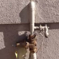 Right - Water pressure reducing valves should be installed prior to fixture piping such as where water enters the home.