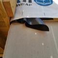 Wrong - Water proofing barrier is not laid flat against foundation wall.
