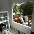 A new high-performance window will be installed in the rough opening of this existing home