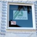 Window flashing is overlapped to  provide a continuous drainage plane.
