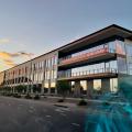 Wrong – The south side of this building in Arizona has very little architectural or landscape shading to block solar heat gain.