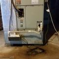 Wrong - Condensate pipe is draining onto basement floor.