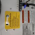 Wrong - Dehumidifier unit was not commisioned before following installation and the installer forgot to remove this tag and plug the holes.