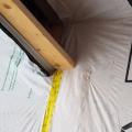 Wrong - House wrap was not properly cut and adhered where the roof meets the wall so water is likely to get behind the house wrap. 