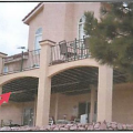 Wrong – This deck is constructed with metal railings and the wooden supports are covered with fire-resistant stucco; however, the exposed wooden beams on the underside of the deck still pose a significant fire hazard.