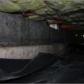 Wrong – The vapor barrier is not secured to the walls of this crawlspace.