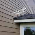 Wrong – The flashing of the roof-wall juncture was installed above the roof shingles instead of below the roof shingles; also no kickout flashing was installed.