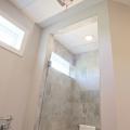Right – This bath fan runs continuously at low speed and is activated by a motion sensor to operate a higher speeds.