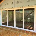The exterior of the home is wrapped in a continuous layer of rigid foam with all seams taped to provide a thermal, air, and moisture barrier and serve as a drainage plane, eliminating the need for house wrap.