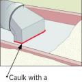 Caulk air seals the boot to the ceiling
