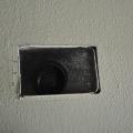 Air seal duct boot to ceiling by installing fiberglass mesh tape and mastic over seam