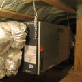 This HRV, installed in a conditioned attic, provides balanced ventilation to the whole home