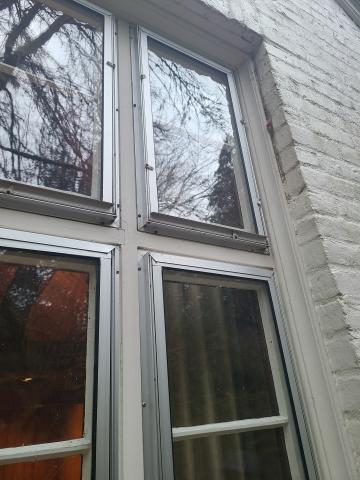 These storm windows are fixed, meaning they do not raise and lower.