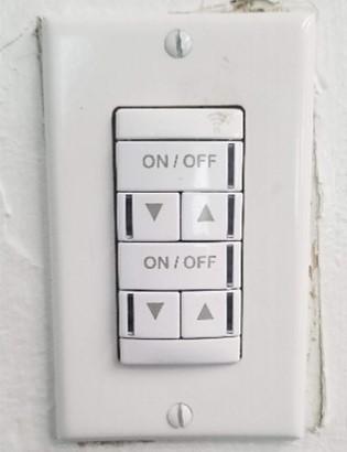 This manual dimmer switch controls the lighting output of multiple fixtures to save energy.