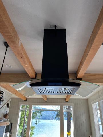 This down-draft range hood fan pulls kitchen particles, smoke, steam, and odors out of the home