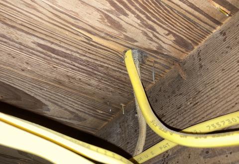Electrical wires for outlets often penetrate the subfloor where there is a wall directly above.