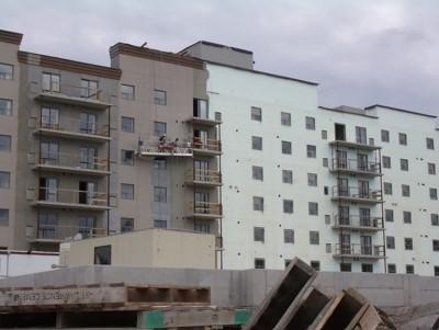 This multistory multifamily building was constructed of insulated concrete forms (ICFs); synthetic stucco can be applied directly over the ICF 