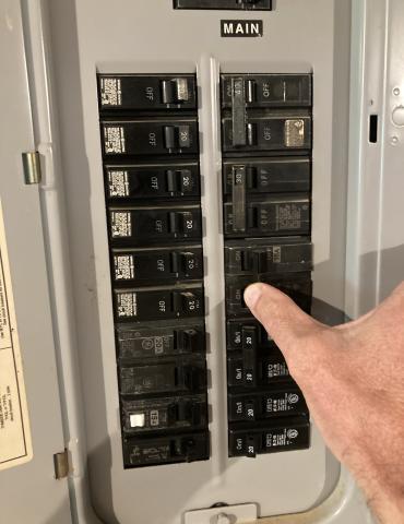 Flip the breakers for the water heater to the “off” position before flushing the water heater tank.