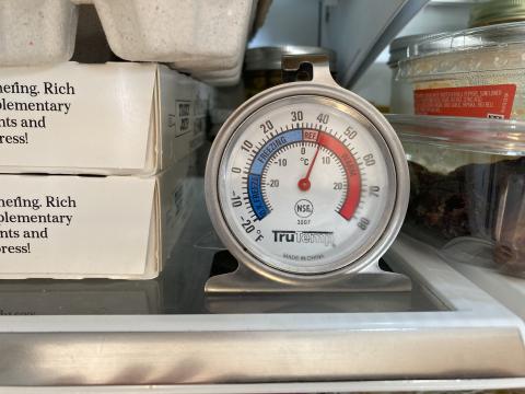  The thermometer in this freezer indicates an acceptable temperature below 0°F (-18°C)