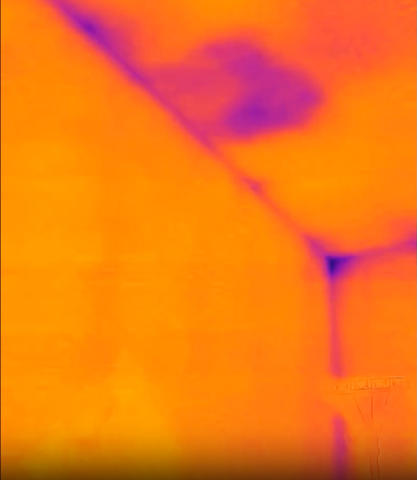 This IR camera image of an exterior wall shows fairly even, warm color indicating that the wall insulation is providing a consistent adequate layer of insulation across the wall.