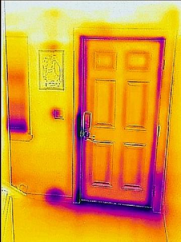 Wrong - This IR image shows a lack of air-sealing around the door, window, and light switch that is allowing in cold air.